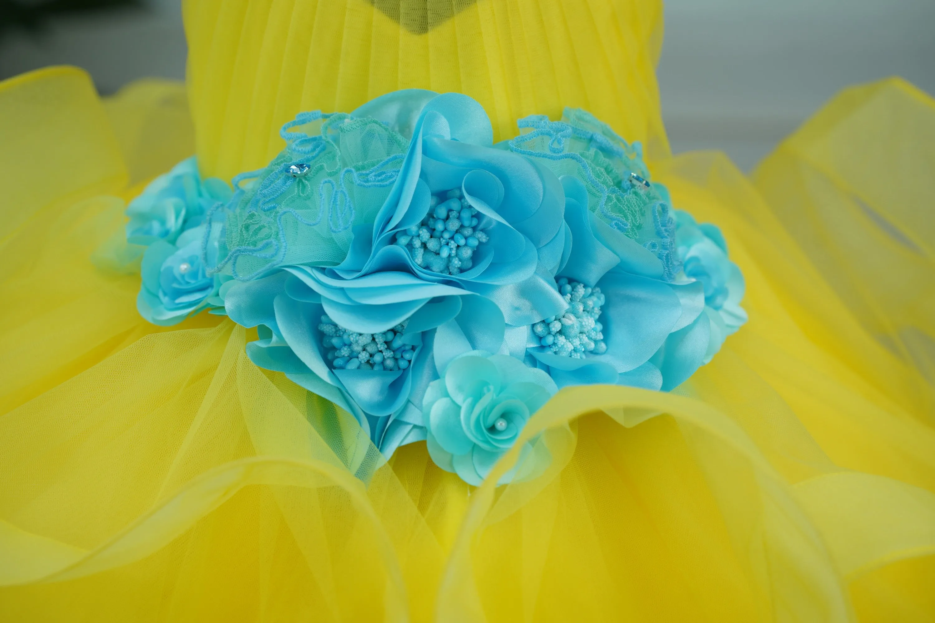 Pre-Order:  Aqua Blue Halter Neck Twirled Couture Gown With Aqua Blue Flower Embellishments