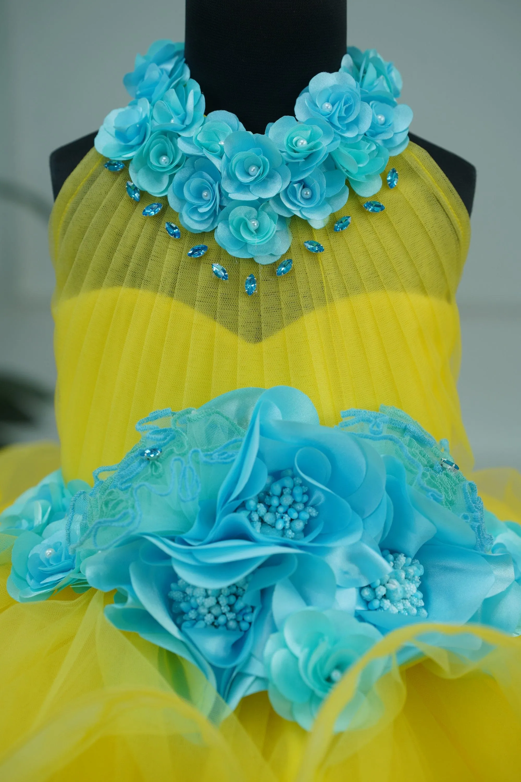 Pre-Order:  Aqua Blue Halter Neck Twirled Couture Gown With Aqua Blue Flower Embellishments