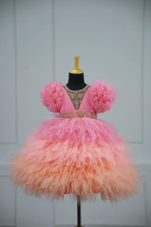 Pre-Order:  Flamingo Pink And Light Peach Feather Frilled Gown With Rich Golden Bead Work Gown