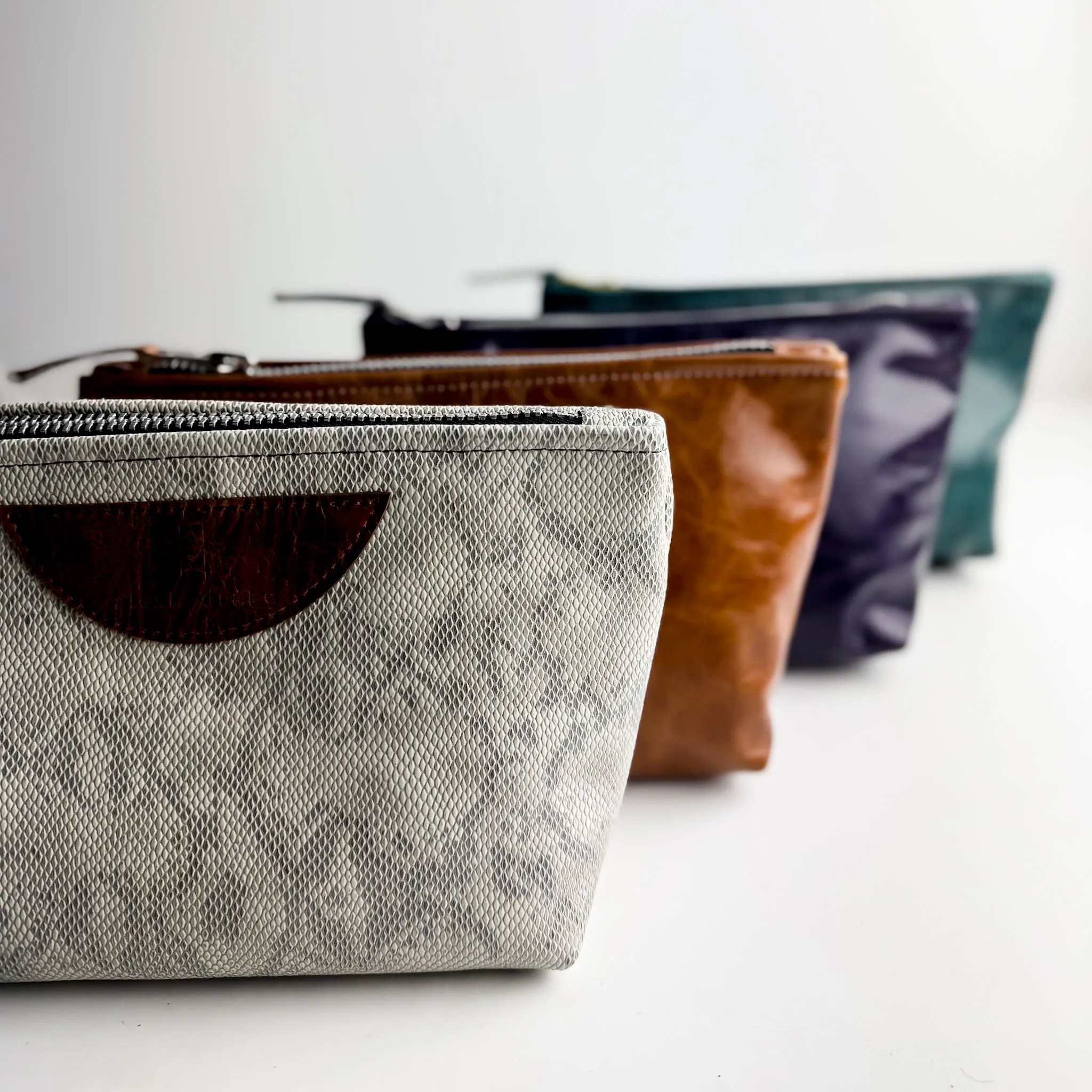 Western Woods Collection | Carry-More Clutch | Teal Spruce